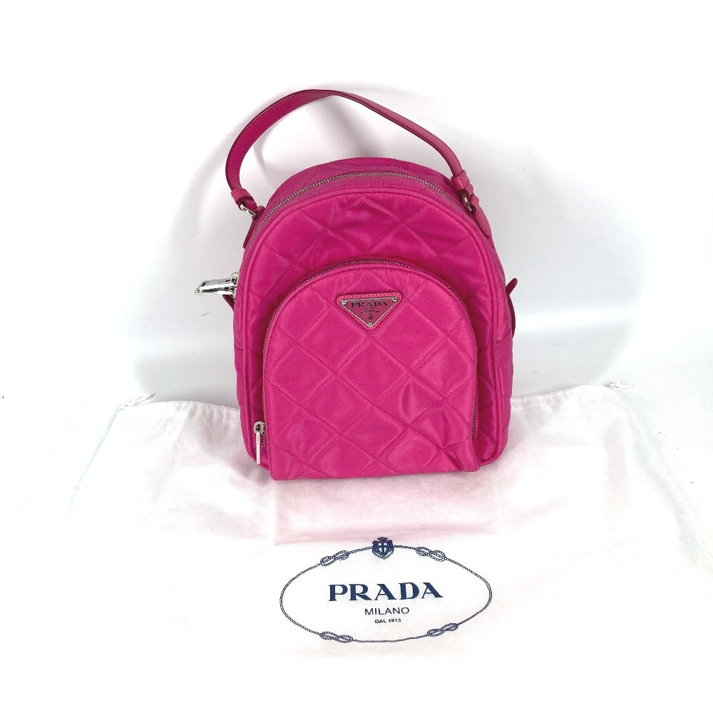 Prada Backpack 1 Bz066 Nylon, Saffiano Leather Pink Triangle Logo Plate Quilted Backpack Women Used Authentic